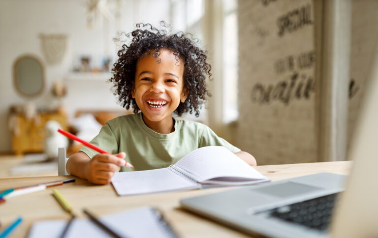 happy child learning with mftc carer